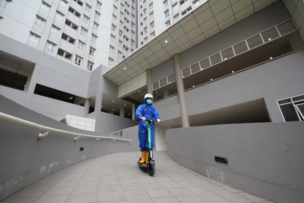 BUMN Gandeng Grab Sediakan Skuter Listrik di RS Darurat Wisma Atlet