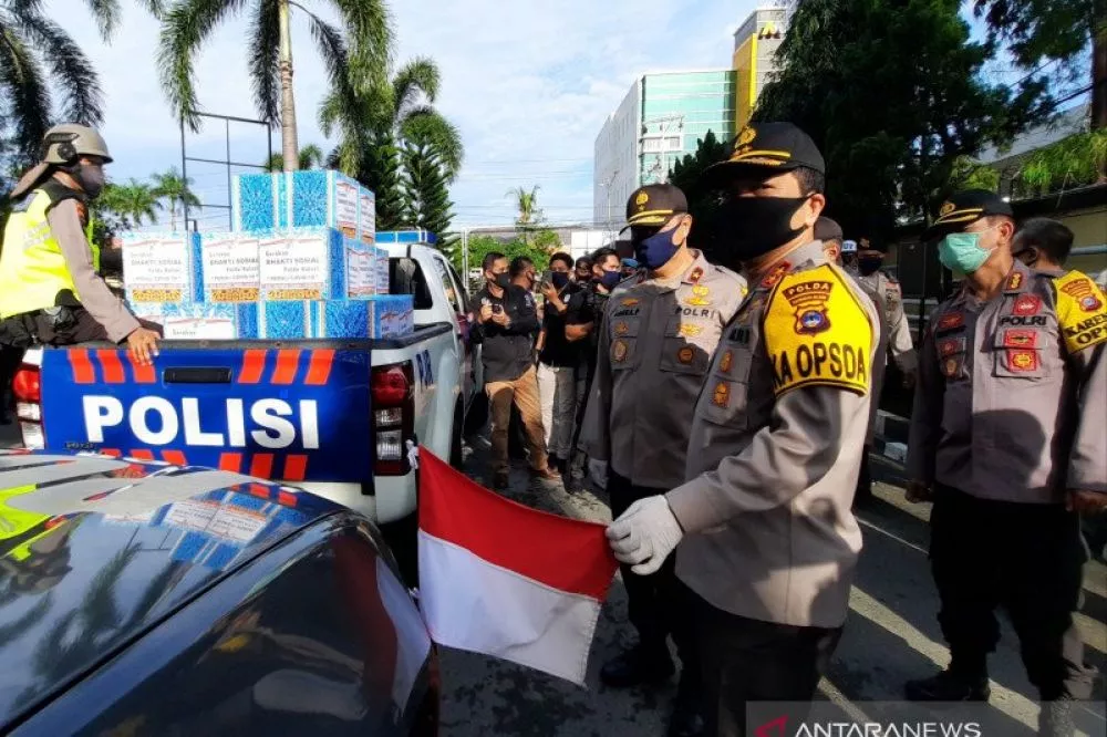 Wajib Kibarkan Merah Putih di Mobil Patroli